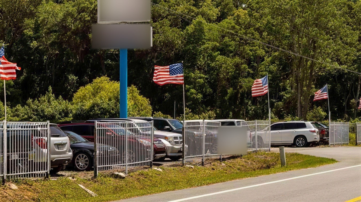 Fenced parking lot on Airport Road in Jacksonville, Florida — the future EZ Truck Parking Jacksonville yard.